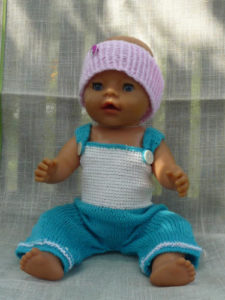 Baby- und Puppenkleidung